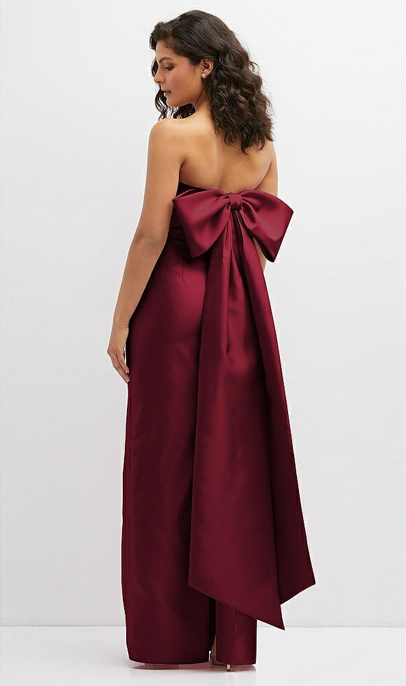 Back View - Burgundy Strapless Draped Bodice Column Dress with Oversized Bow