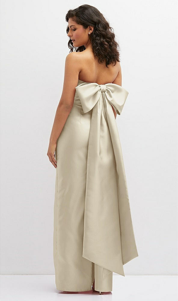 Back View - Champagne Strapless Draped Bodice Column Dress with Oversized Bow
