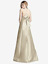 Front View Thumbnail - Champagne Strapless A-line Satin Gown with Modern Bow Detail