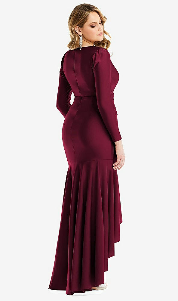 Back View - Cabernet Long Sleeve Pleated Wrap Ruffled High Low Stretch Satin Gown