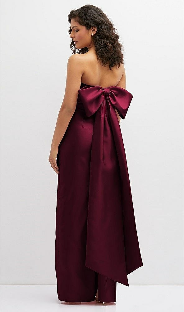 Back View - Cabernet Strapless Draped Bodice Column Dress with Oversized Bow