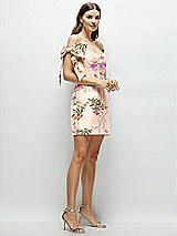 Side View Thumbnail - Butterfly Botanica Pink Sand Floral Satin Off-the-Shoulder Bow Corset Fit and Flare Mini Dress