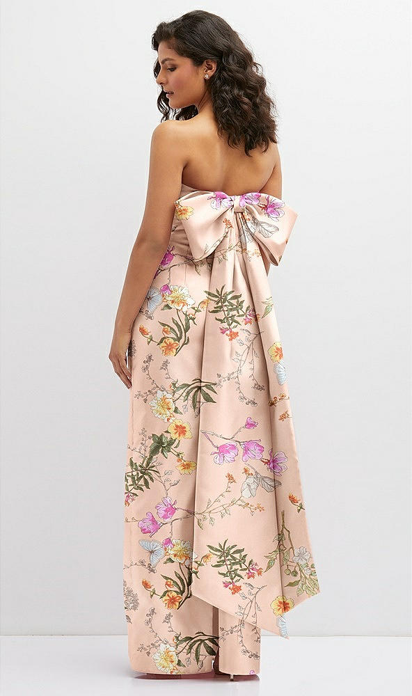 Back View - Butterfly Botanica Pink Sand Floral Strapless Draped Bodice Column Dress with Oversized Bow
