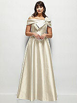 Front View Thumbnail - Champagne Asymmetrical Bow Off-Shoulder Satin Gown with Ballroom Skirt