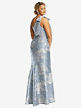 Rear View Thumbnail - Porcelain Blue Seraphina Floral Bow One-Shoulder Floral Satin Trumpet Gown