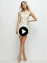 Video 1 Thumbnail - Ivory Gold Rosette Bow-Strap Ivory Gold Rosette Bustier Mini Dress