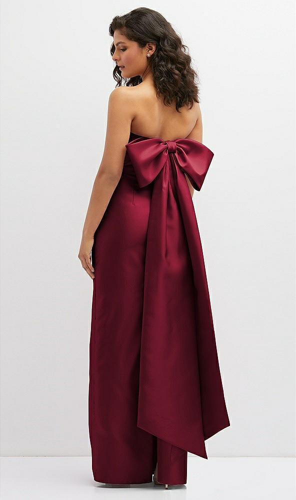 Back View - Burgundy Strapless Draped Bodice Column Dress with Oversized Bow