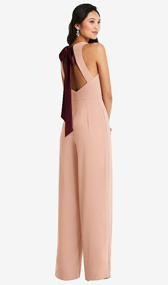 Front View - Pale Peach & Cabernet Cutout Open-Back Halter Jumpsuit with Scarf Tie