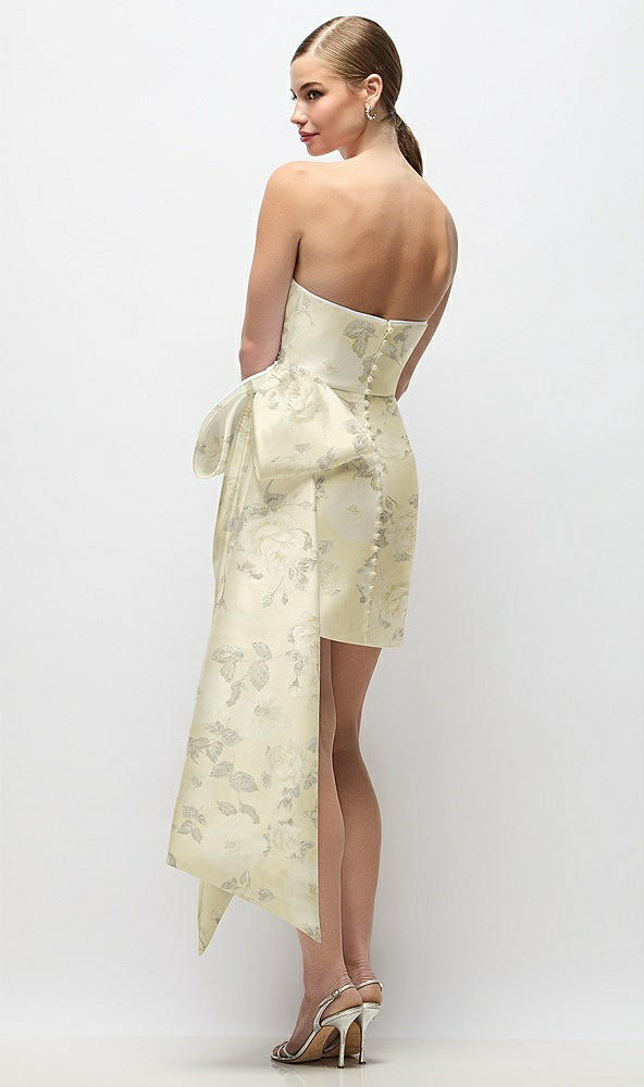 Back View - Butter Yellow Floral Strapless Pleated Draped Floral Satin Mini Dress with Dramatic Long Tail Bow & Covered Buttons