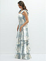 Side View Thumbnail - Porcelain Blue Seraphina Floral Floral Bow-Shoulder Satin Maxi Dress with Asymmetrical Tiered Skirt