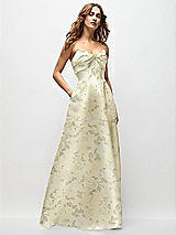 Front View Thumbnail - Butter Yellow Floral Strapless Twist Cuff Neck Floral Satin Maxi Dress with Basque-Waist & Full Skirt