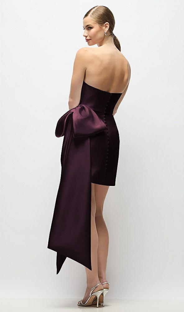 Back View - Deep Plum Strapless Pleated Draped Satin Mini Dress with Dramatic Long Tail Bow & Covered Buttons