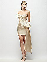 Front View Thumbnail - Champagne Strapless Pleated Draped Satin Mini Dress with Dramatic Long Tail Bow & Covered Buttons