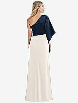 Rear View Thumbnail - Ivory & Midnight Navy One-Shoulder Bell Sleeve Trumpet Gown